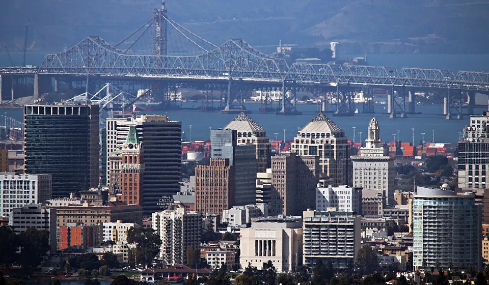 Regional view: The Oakland skyline and bay bridges
